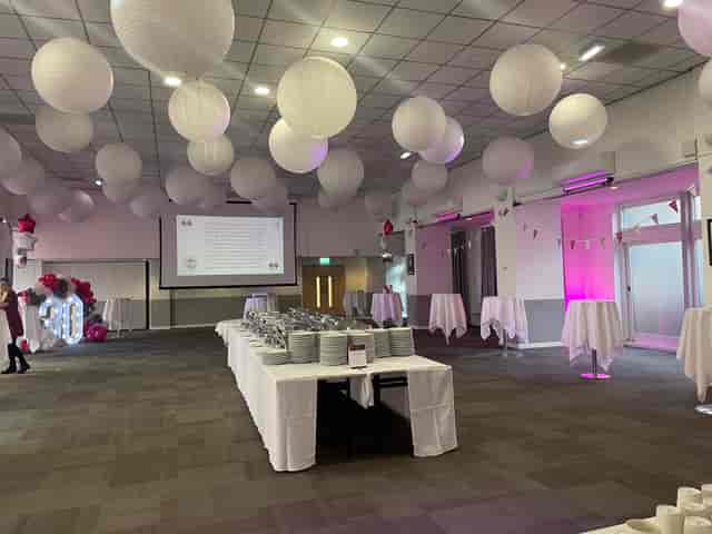 Pioneer Room at Manchester Conference Centre with elegant round tables for events.