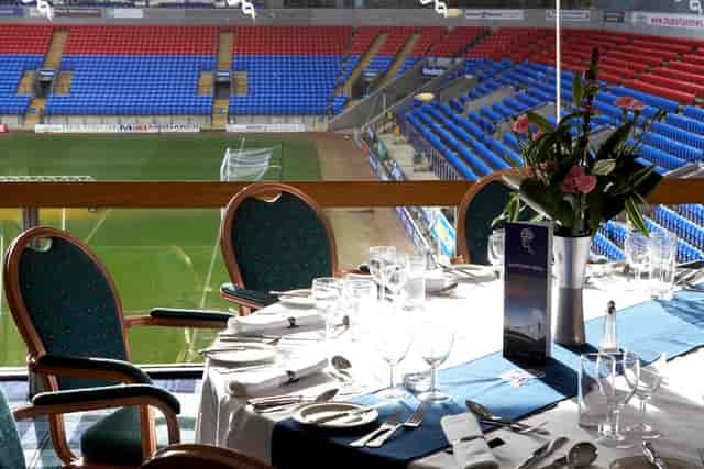 Executive Box at Bolton Whites Hotel with elegant dining setup for corporate events.
