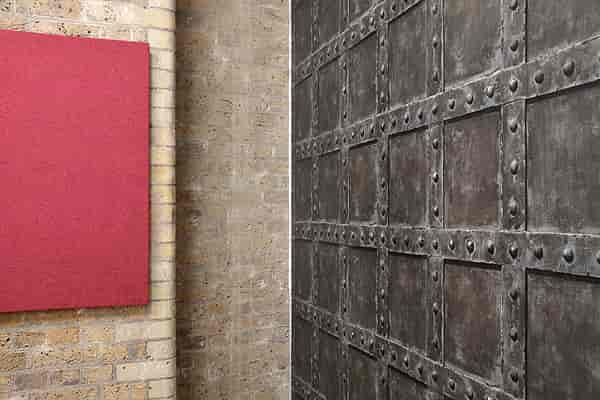 Equinox venue with textured brick wall and red panel, perfect for creative events.