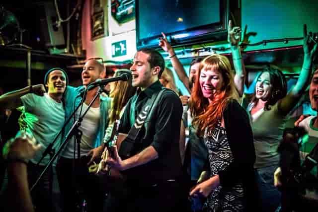 Vibrant live music event at The Lower Deck, Tamesis Dock, perfect for networking.