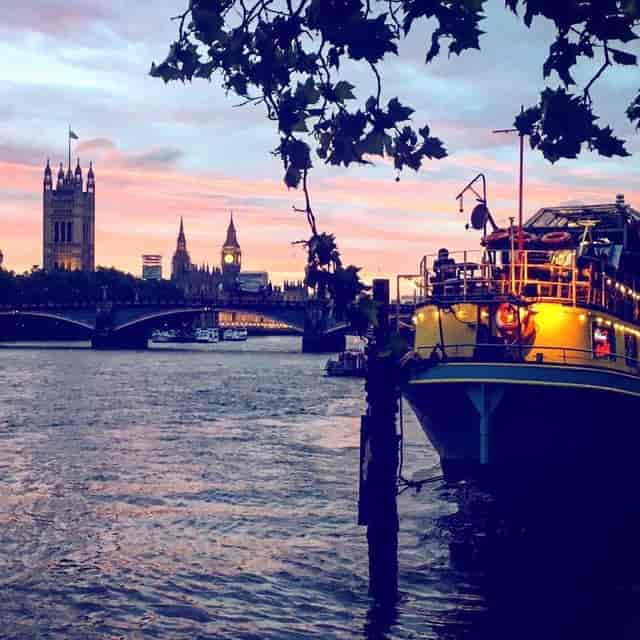 "Riverside venue at Tamesis Dock with sunset skyline, ideal for unique events and receptions."