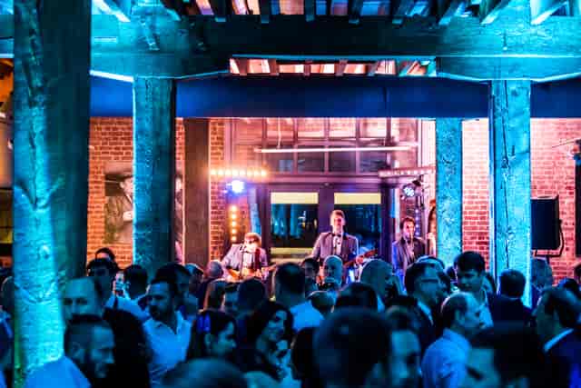 Muscovado Hall at London Museum Docklands hosts a lively band for networking events.