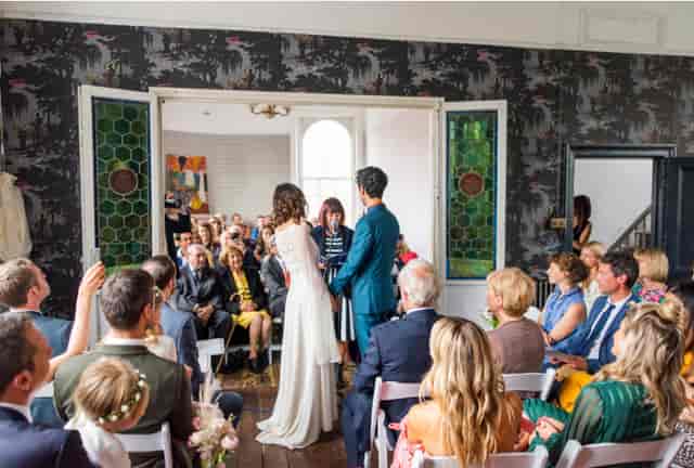 Historic wedding venue at The Roost with theater seating for intimate ceremony.