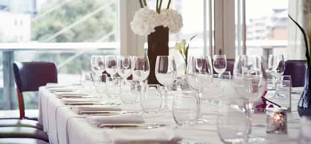 Private dining room at The Lowry Hotel with elegant table setting for corporate events.