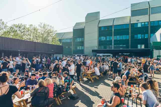 Vibrant outdoor event at Container Yard, Printworks London, perfect for networking and socializing.