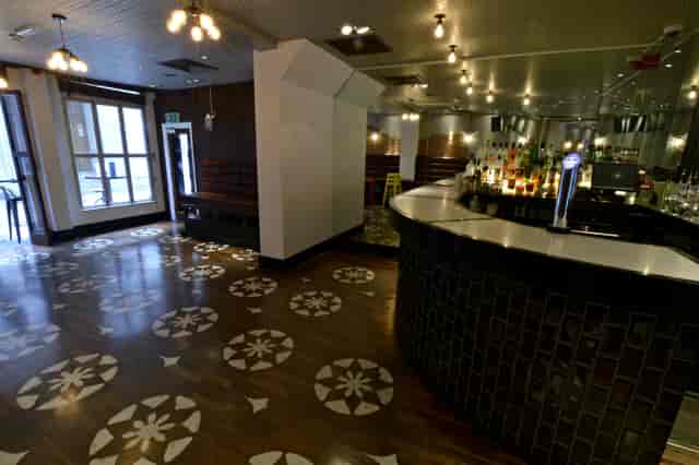 Stylish private room with modern bar for networking events at Patch St Paul’s.