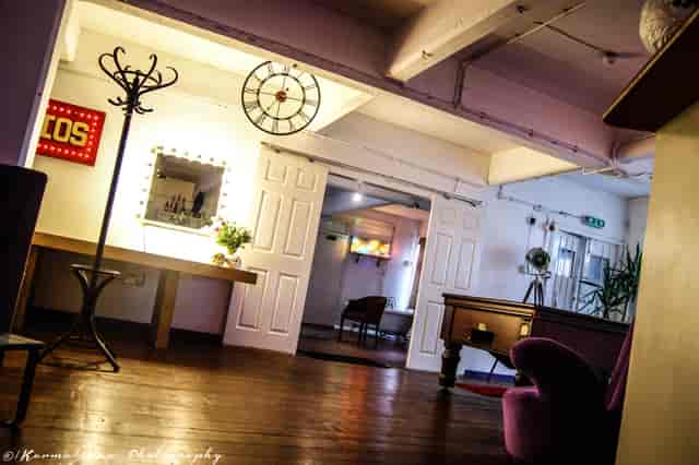 Versatile 4th Floor event space with stylish decor, ideal for meetings and gatherings.