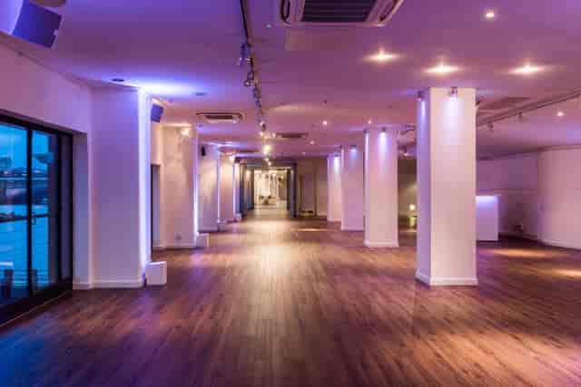 Spacious OXO2 venue with polished floors, ideal for corporate events and receptions.