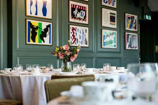 Elegant dining table in The Balcony Room, ideal for upscale meetings and intimate events.