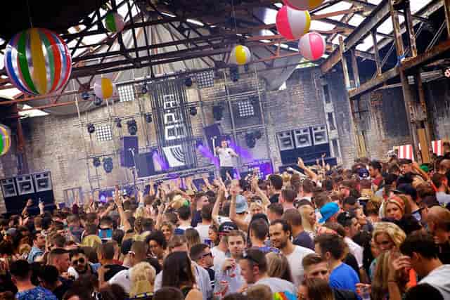 Vibrant crowd at The Roof Garden, ideal for music festivals and corporate parties.