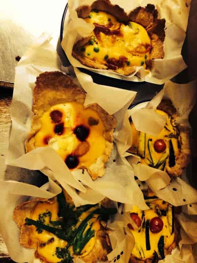 Artisanal tarts on parchment at Top Bar, The Elgin - unique catering for events.