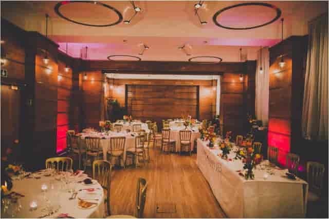 Elegant Bethnal Hall event space with wooden paneling, ideal for formal dinners and celebrations.