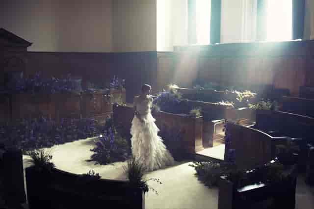 Bethnal Hall at Town Hall Hotel, elegant wedding venue with floral decor and soft lighting.