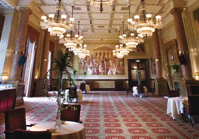 Elegant Reading & Writing Room with chandeliers, perfect for upscale meetings and events.