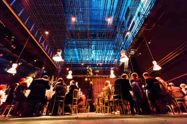Stylish event space at Unique Venues Birmingham with elegant table setting for networking.