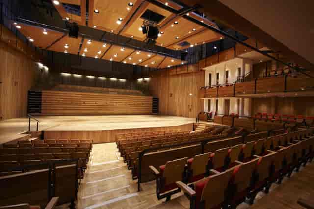 Elgar Concert Hall auditorium with wooden finishes, ideal for performances and conferences.