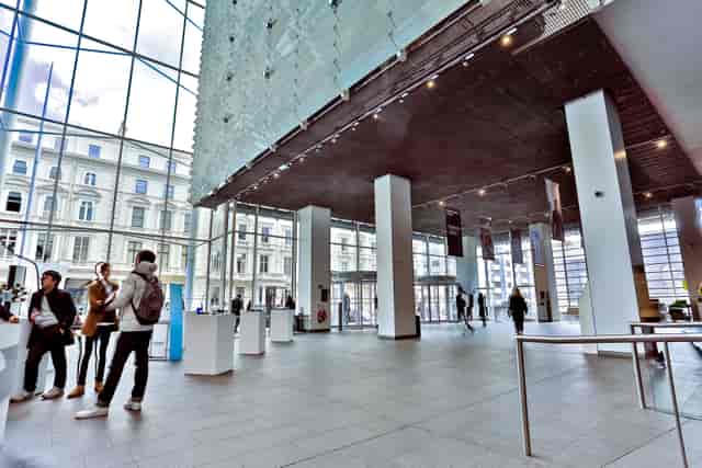 Modern lecture theatre with large windows, ideal for conferences at Imperial College.