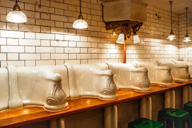 Vintage urinals in Whole Venue, Attendant Fitzrovia - unique event restroom design.