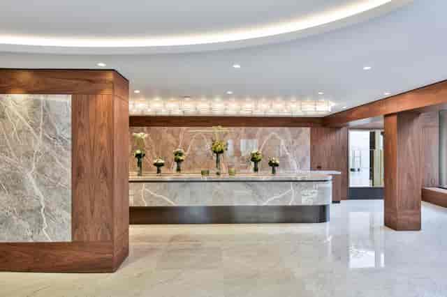 Nine Kings Suite reception, modern marble finishes, ideal for corporate events.