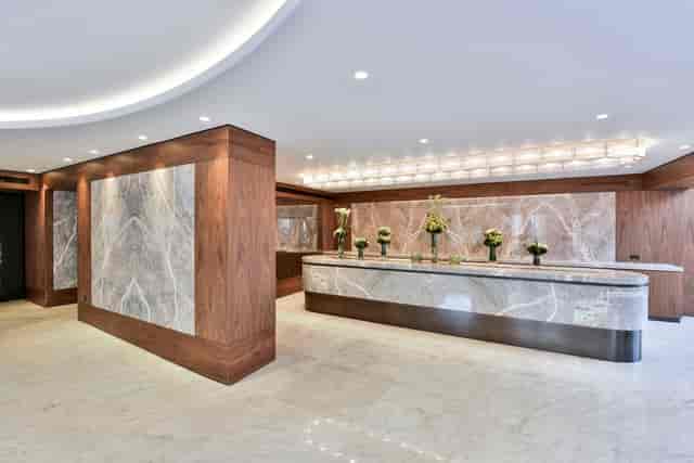 Nine Kings Suite reception, modern marble finishes, ideal for high-end events and networking.