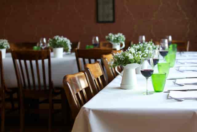 Elegant dining setup in The Gallery, Wine Tun for formal meetings and networking events.