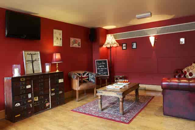 Cozy meeting space in The Lounge, Wine Tun, perfect for workshops and team gatherings.