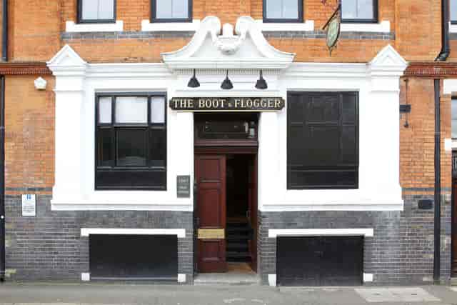 Charming venue entrance at Boot and Flogger, perfect for networking events and gatherings.