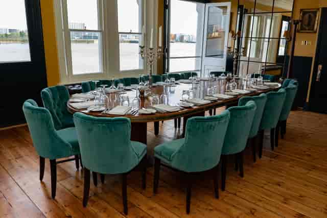 Elegant dining table in The River Room, ideal for corporate dinners and upscale events.