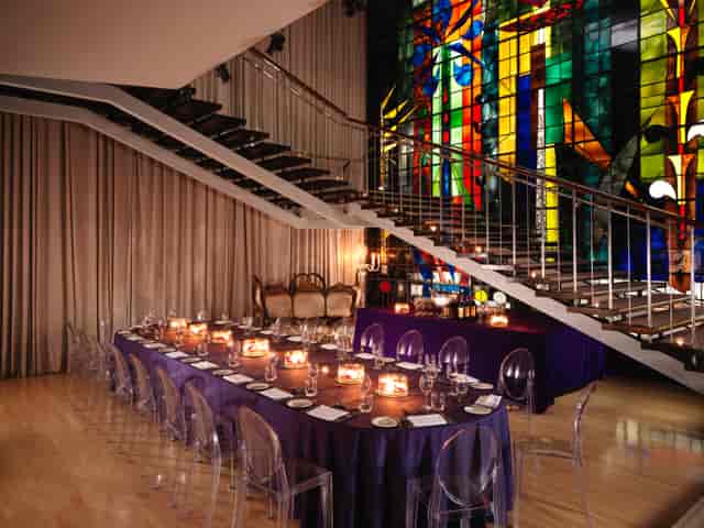 Elegant Billiard Room in Sanderson London with purple linens for upscale events.