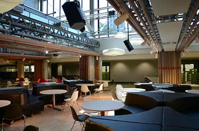 Modern event space in Guild of Students Liverpool with flexible seating for gatherings.