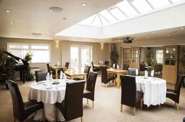 Orchard Suite dining space with elegant decor for corporate events and intimate gatherings.