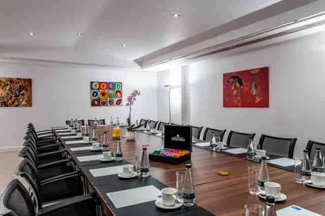 Gallery Room in Adam House: bright meeting space with long table for professional gatherings.