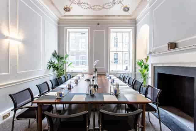 Bacchus Room in Adam House: elegant meeting space with natural light for corporate events.