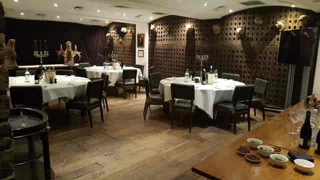 Sophisticated dining room with elegant tables for intimate events at The Jugged Hare.
