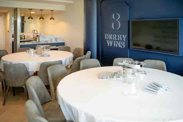 Queen's Single Box at Epsom Downs: modern meeting space for events and networking.